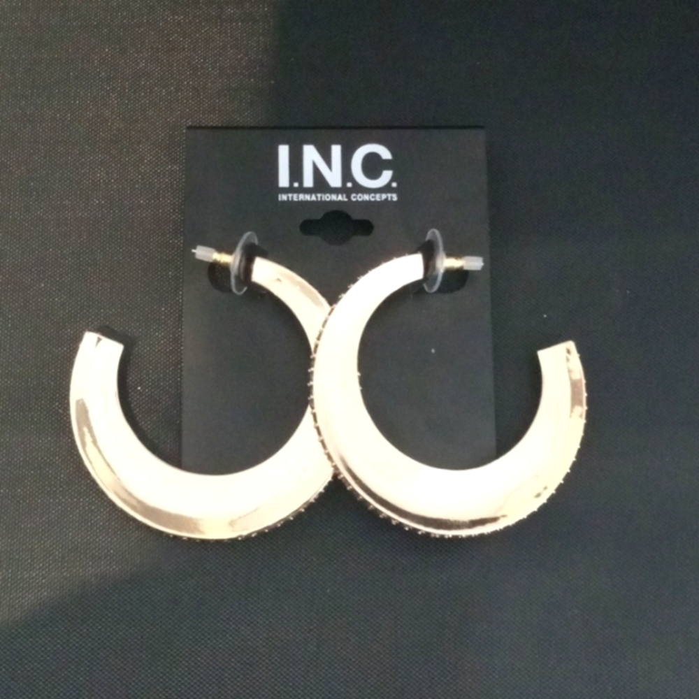 Gold plated black rhinestone hoop earrings.